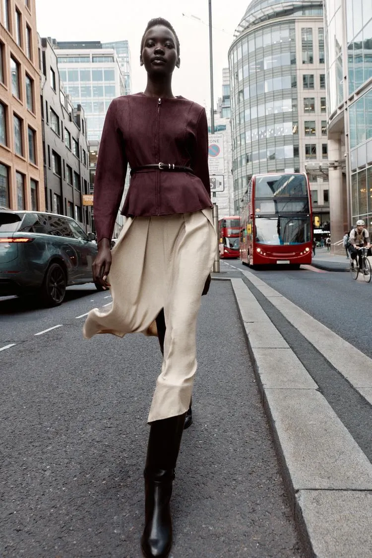 GIUBBOTTO PEPLUM EFFETTO PELLE SCAMOSCIATA CON CINTURA