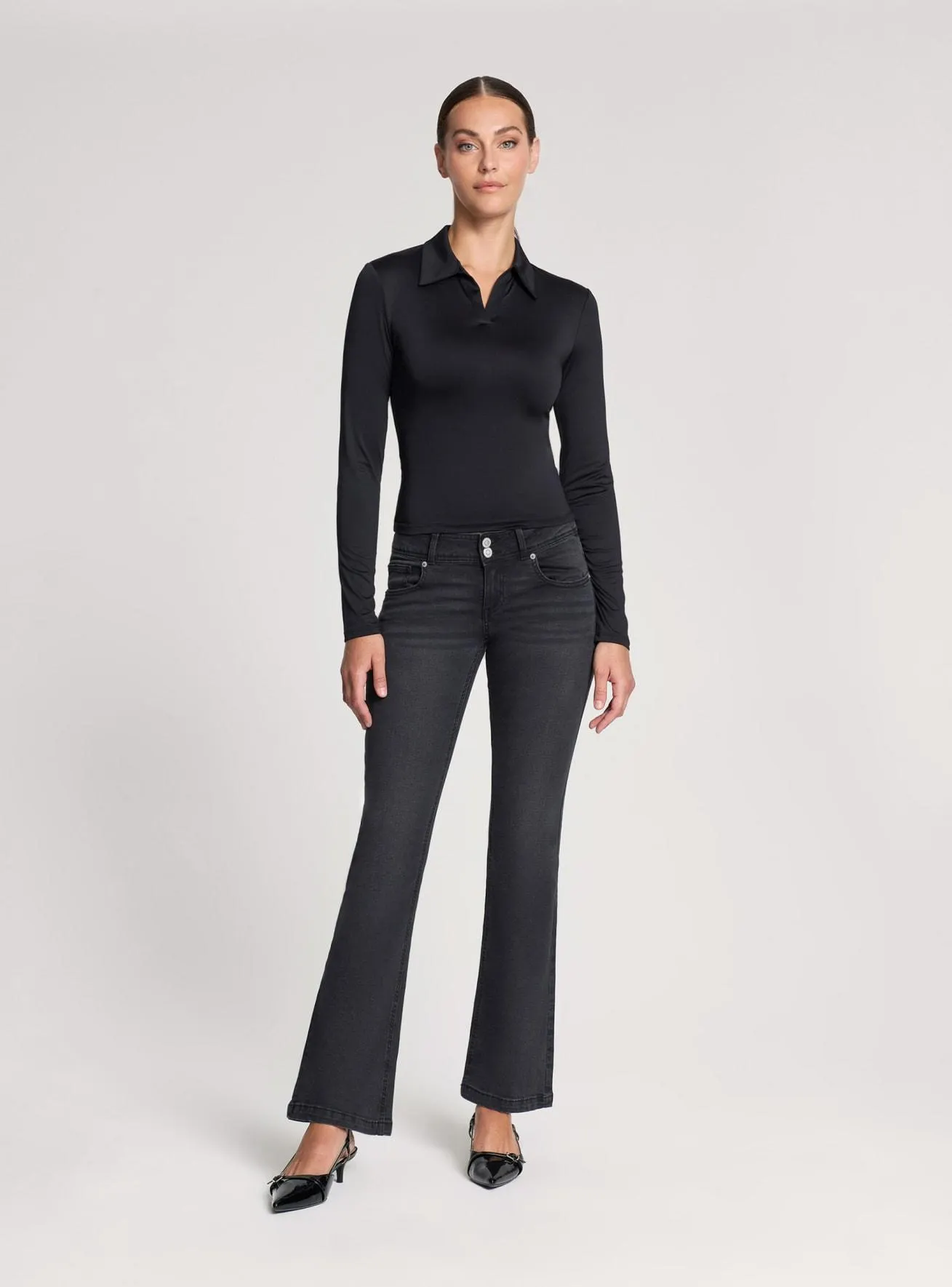 Polo elasticizzata tinta unita Nero