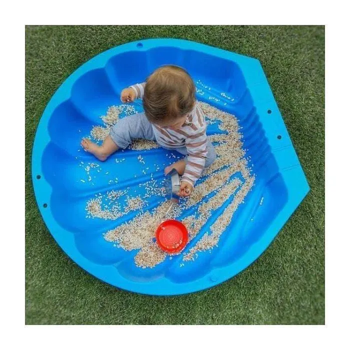 Conchiglia acqua e sabbia