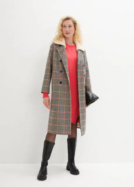 Abito in maglia al ginocchio con spacchi