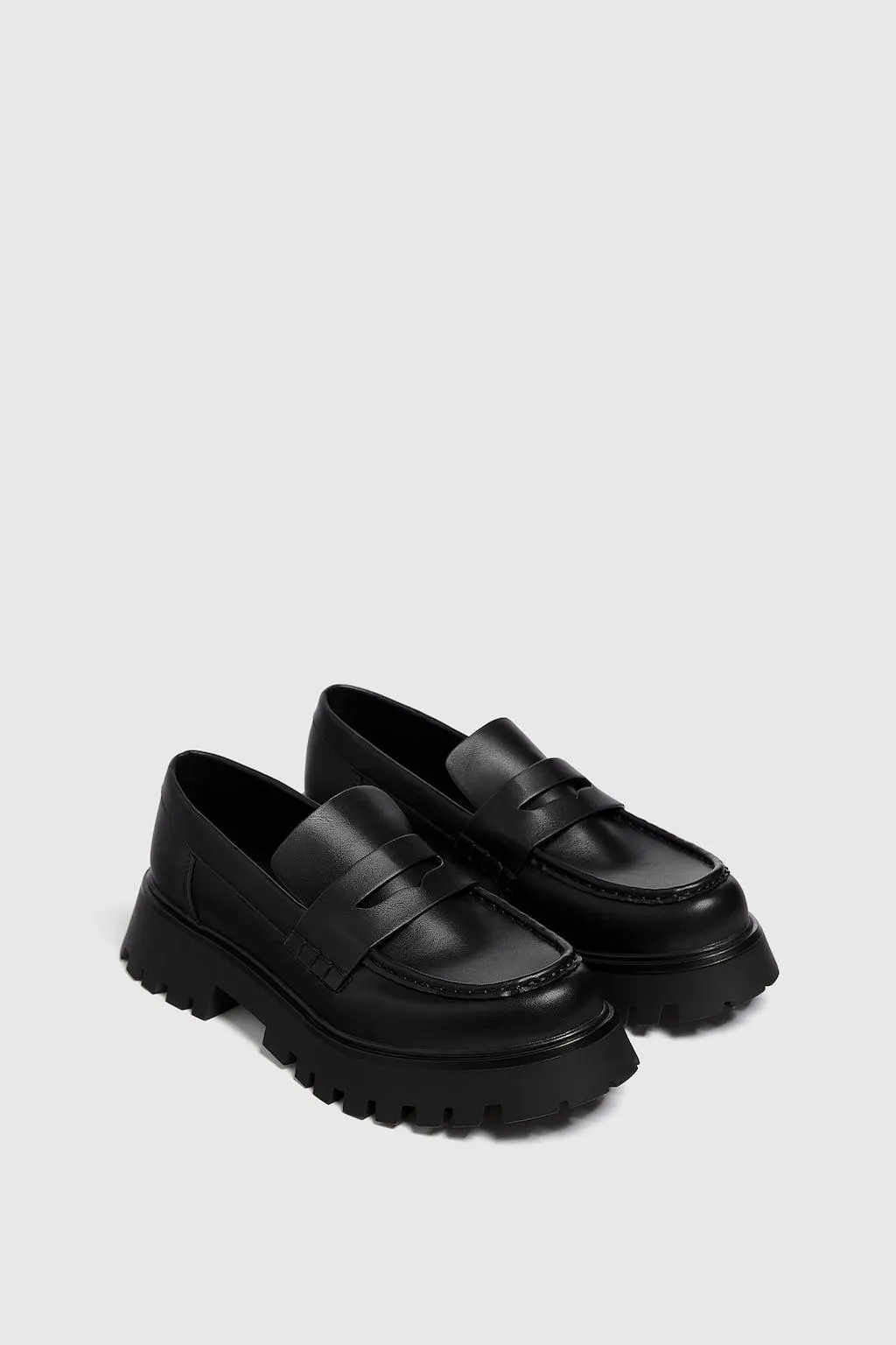 MOCASSINI CON SUOLA TRACK E FASCETTA