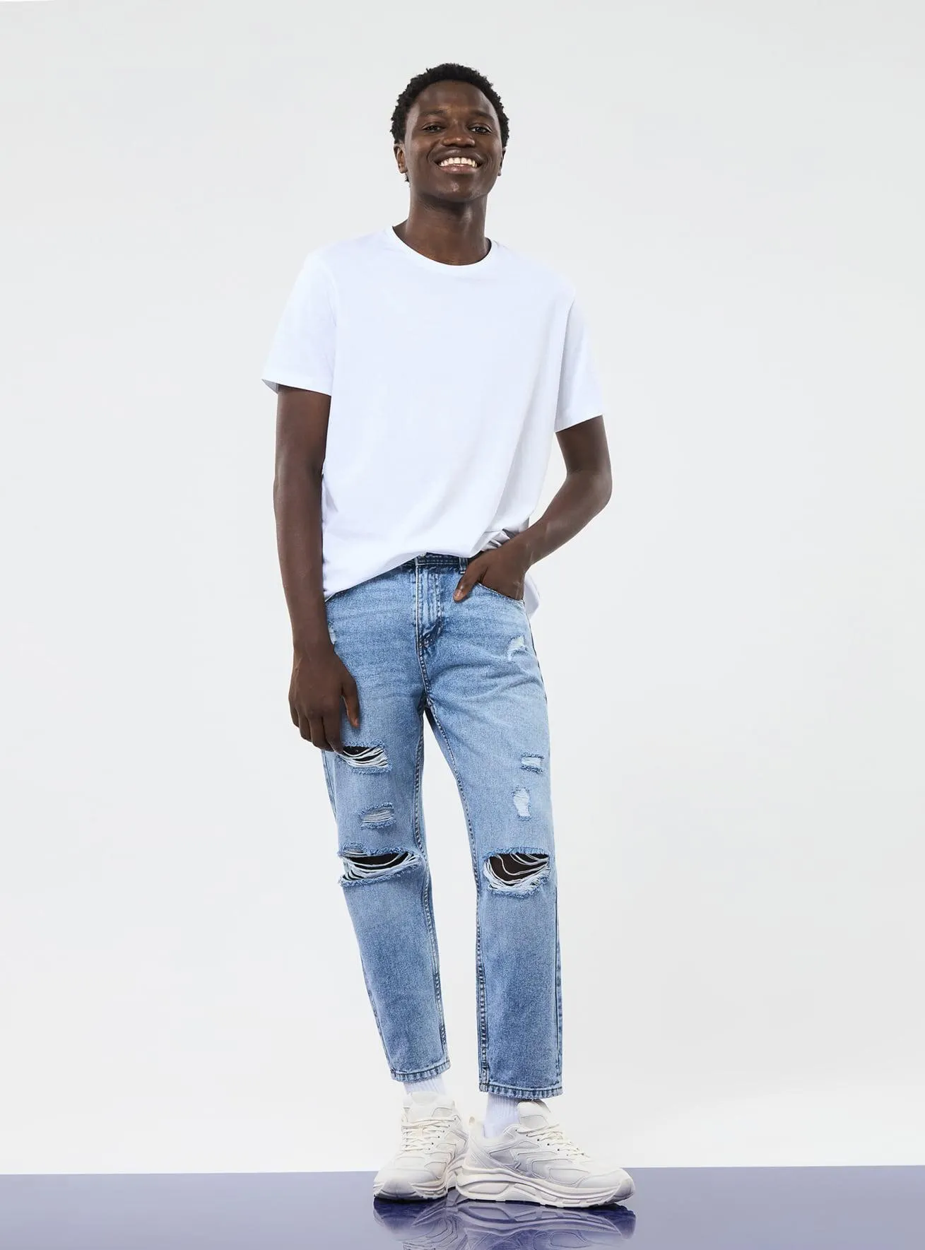 Jeans loose fit con strappi Blu denim medio