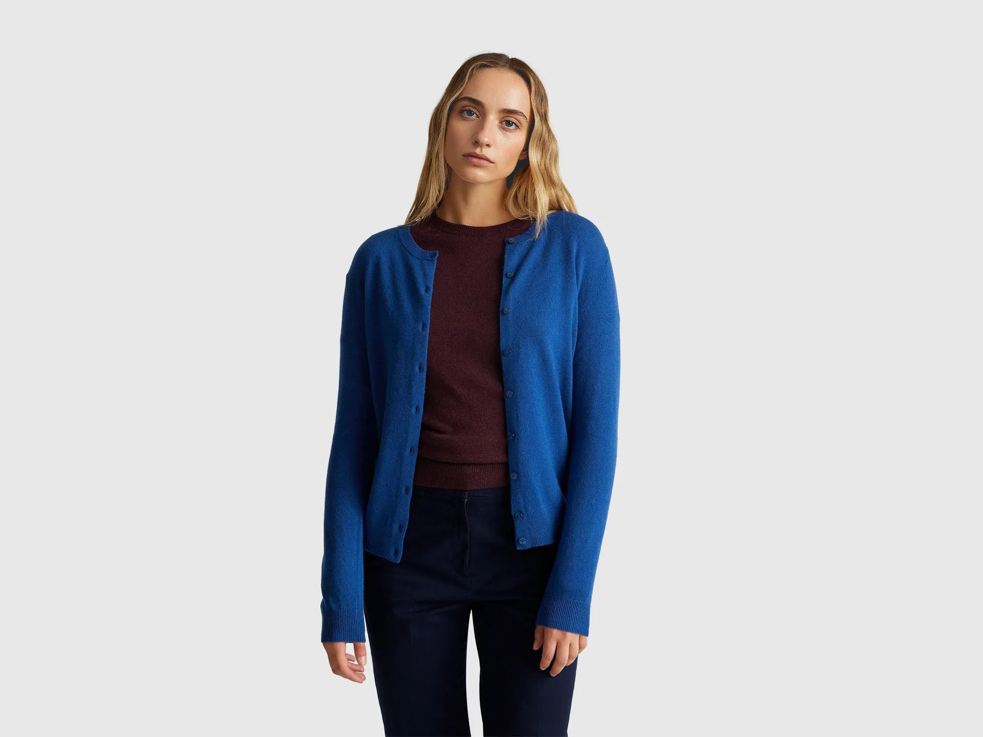 Cardigan girocollo blu in pura lana Merino