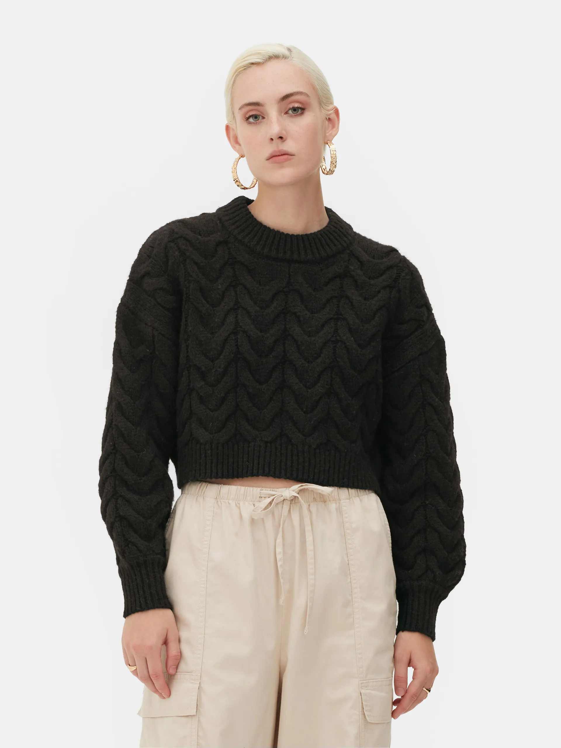 Maglia corta lavorata a trecce Rita Ora