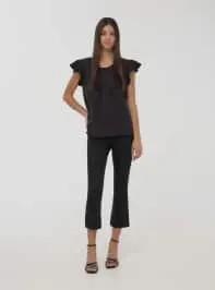 Blusa tinta unita a maniche corte Nero