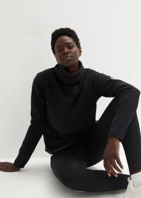 Pile con fori per i pollici alle maniche