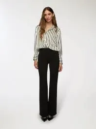 Pantaloni flared a tinta unita Nero