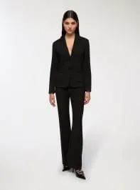 Pantaloni a zampa tinta unita Nero