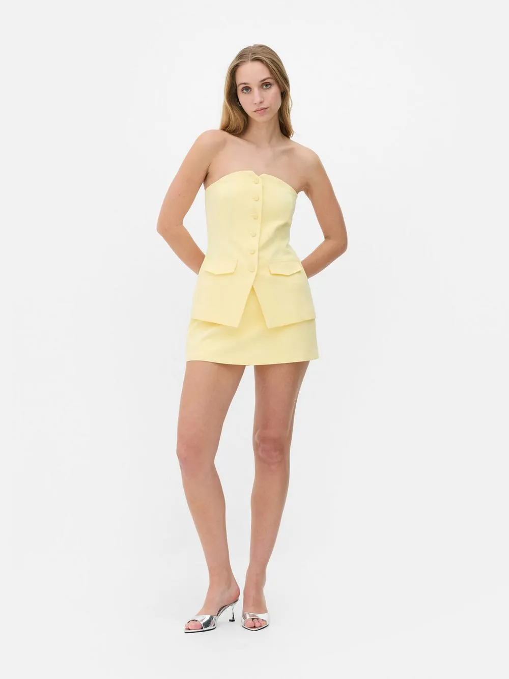 Gilet con bottoni senza spalline