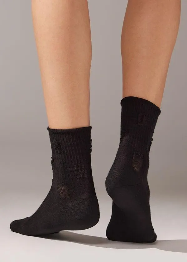 Calze Corte Effetto Strappato
