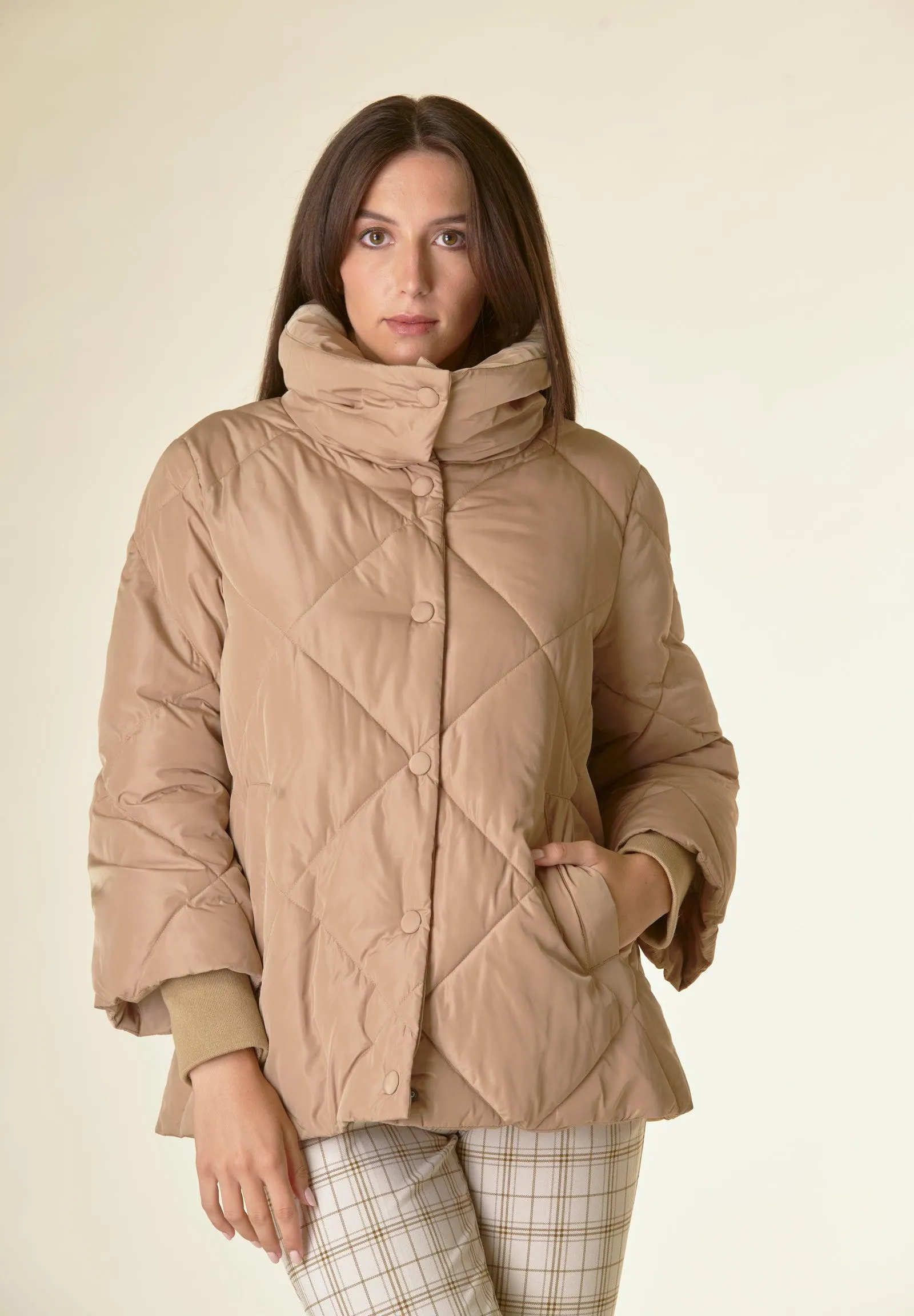 Piumino beige trapuntato