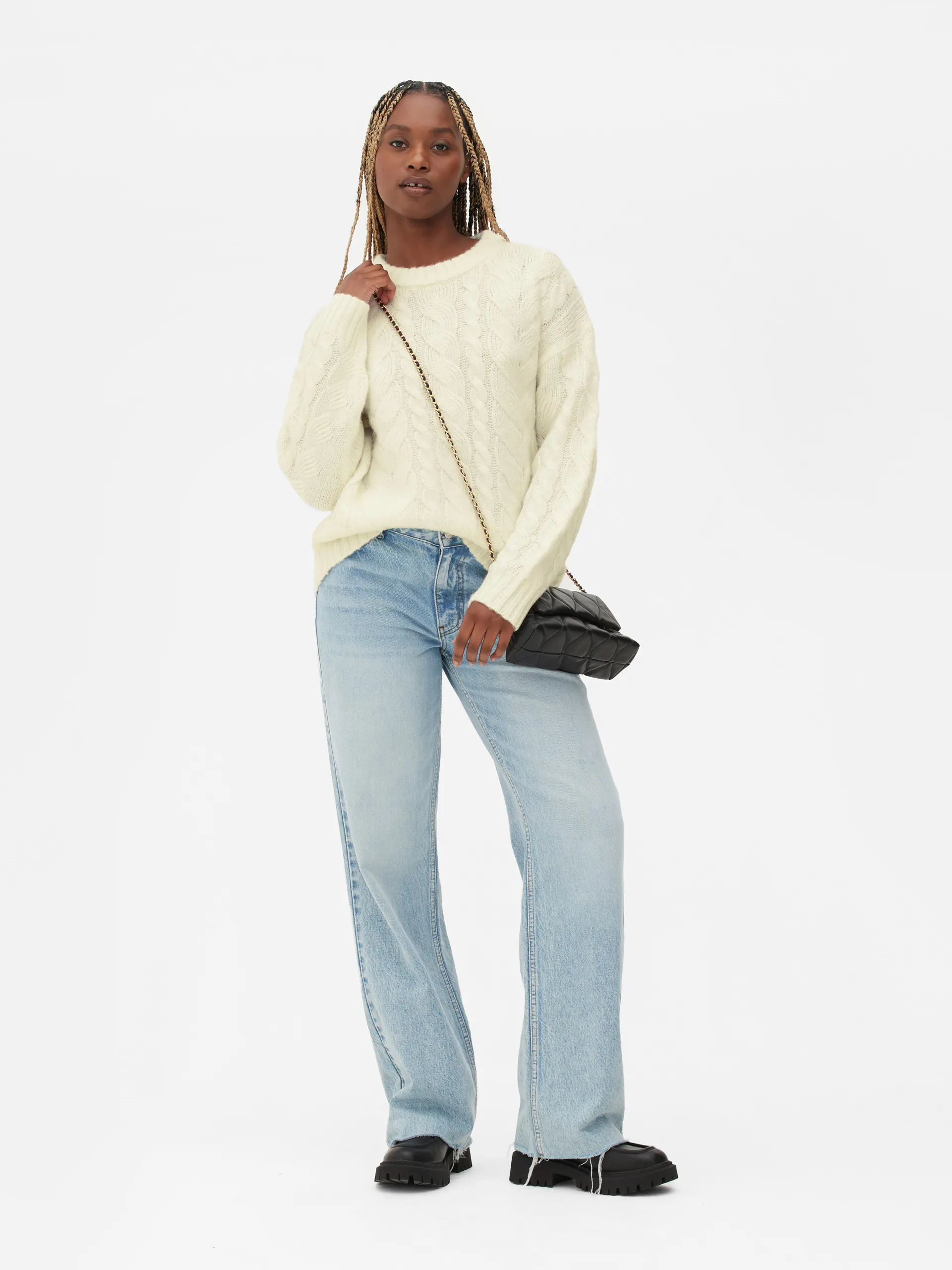 Maglione lavorato a trecce