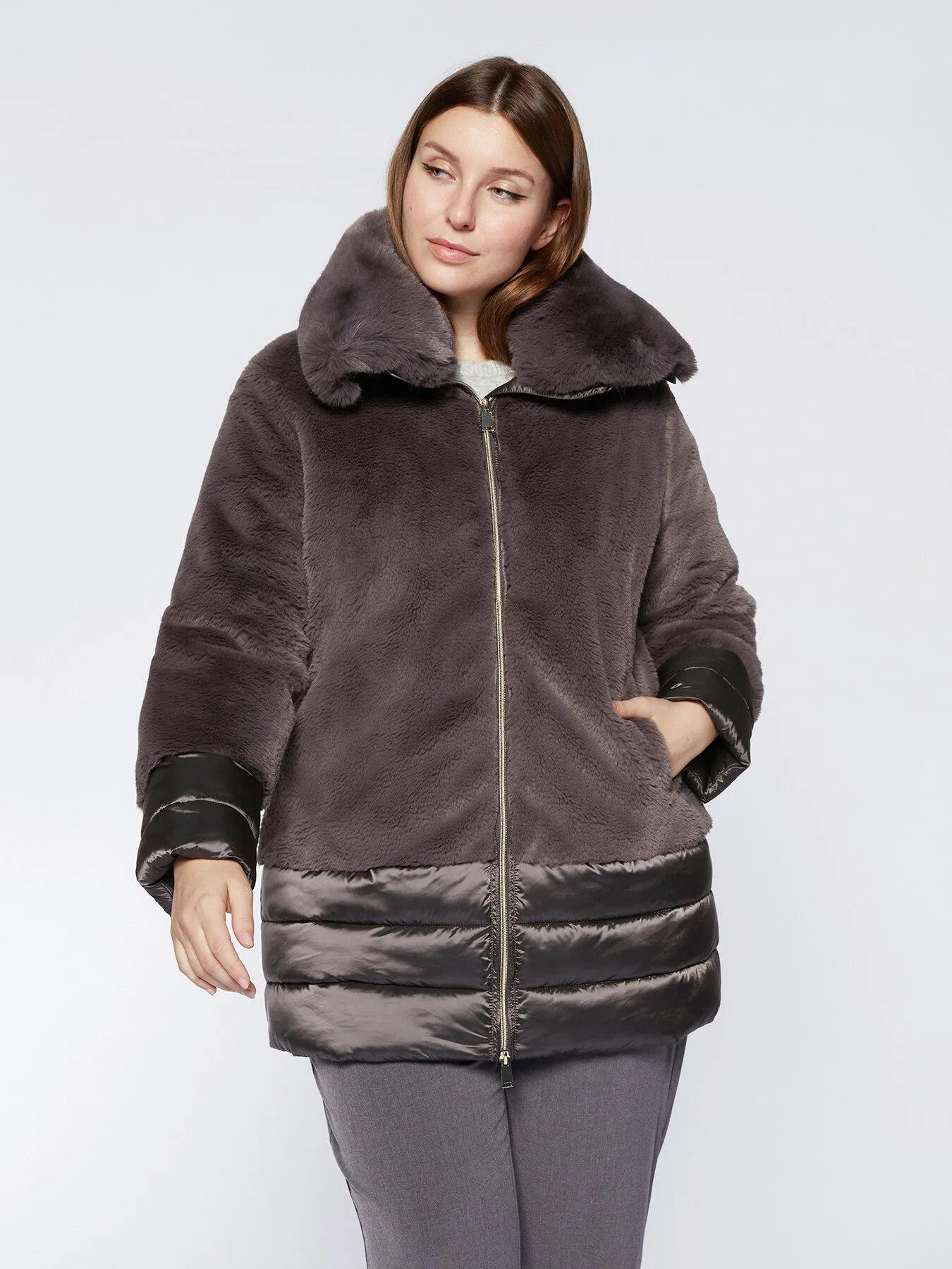 Piumino con parti in similpelliccia