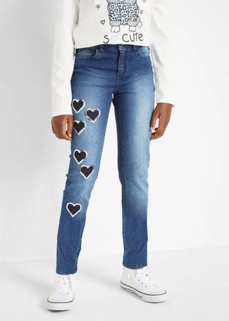 Jeans skinny con cuoricini