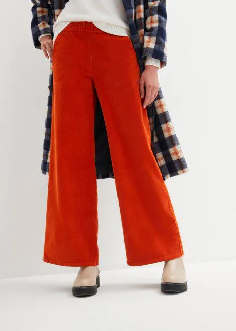 Pantaloni a palazzo cropped in velluto con cinta comoda a vita alta
