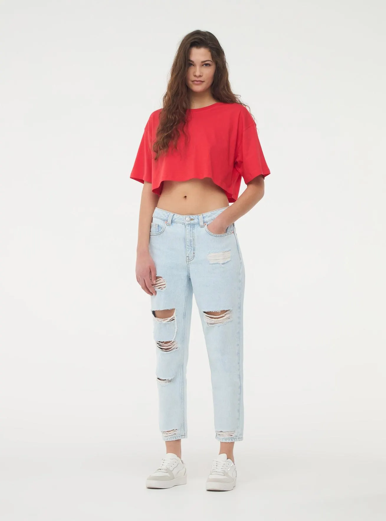 Jeans mom fit con strappi Blu denim chiaro