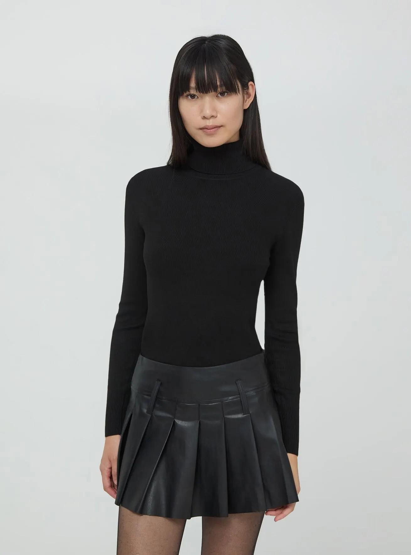 Maglia dolcevita con bottoni decorativi Nero