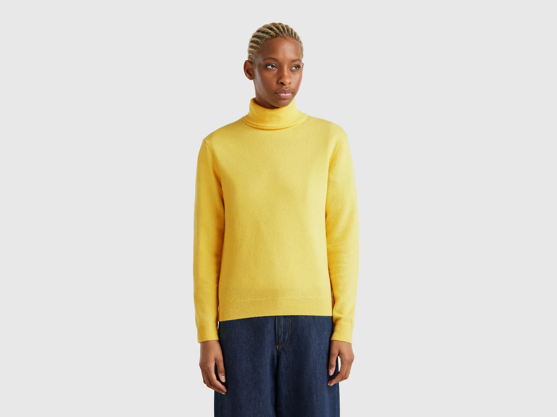 Maglione dolcevita giallo in pura lana Merino