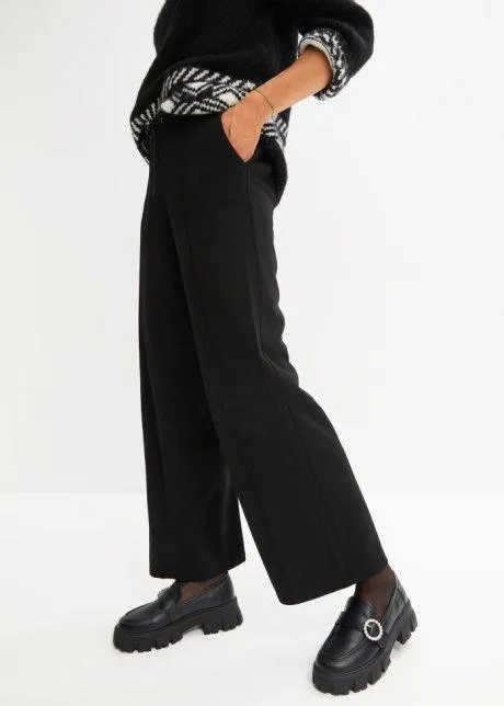 Pantaloni larghi in punto di Roma