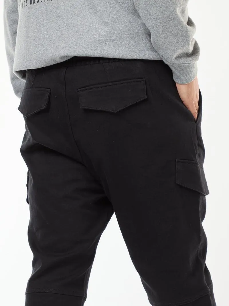 Pantaloni multitasche tinta unita con cintura elasticizzata - Nero