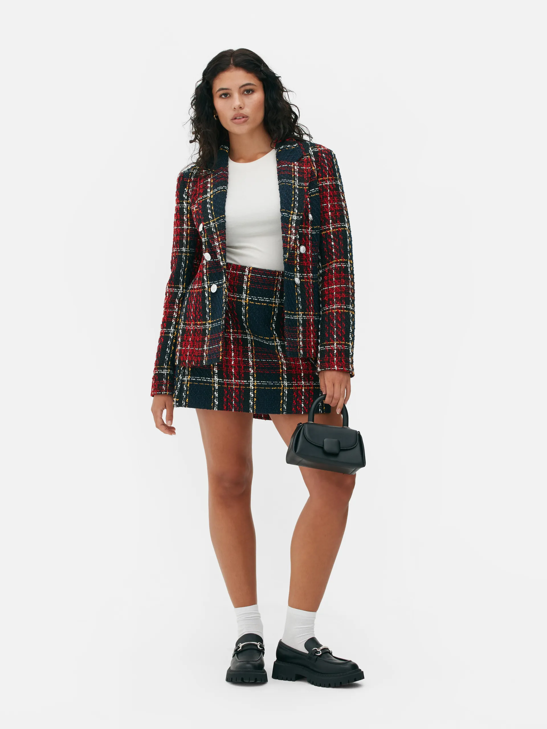 Blazer strutturato in bouclé con motivo scozzese