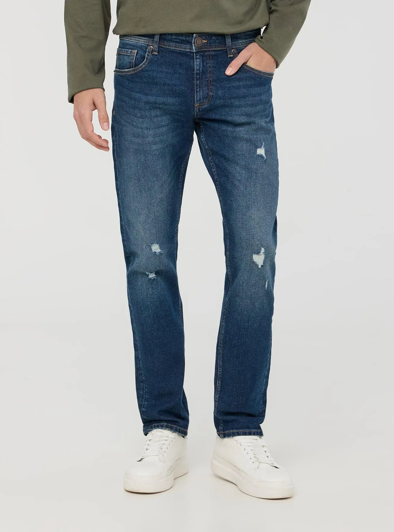 Jeans skinny scuri con piccoli strappi Blu denim scuro