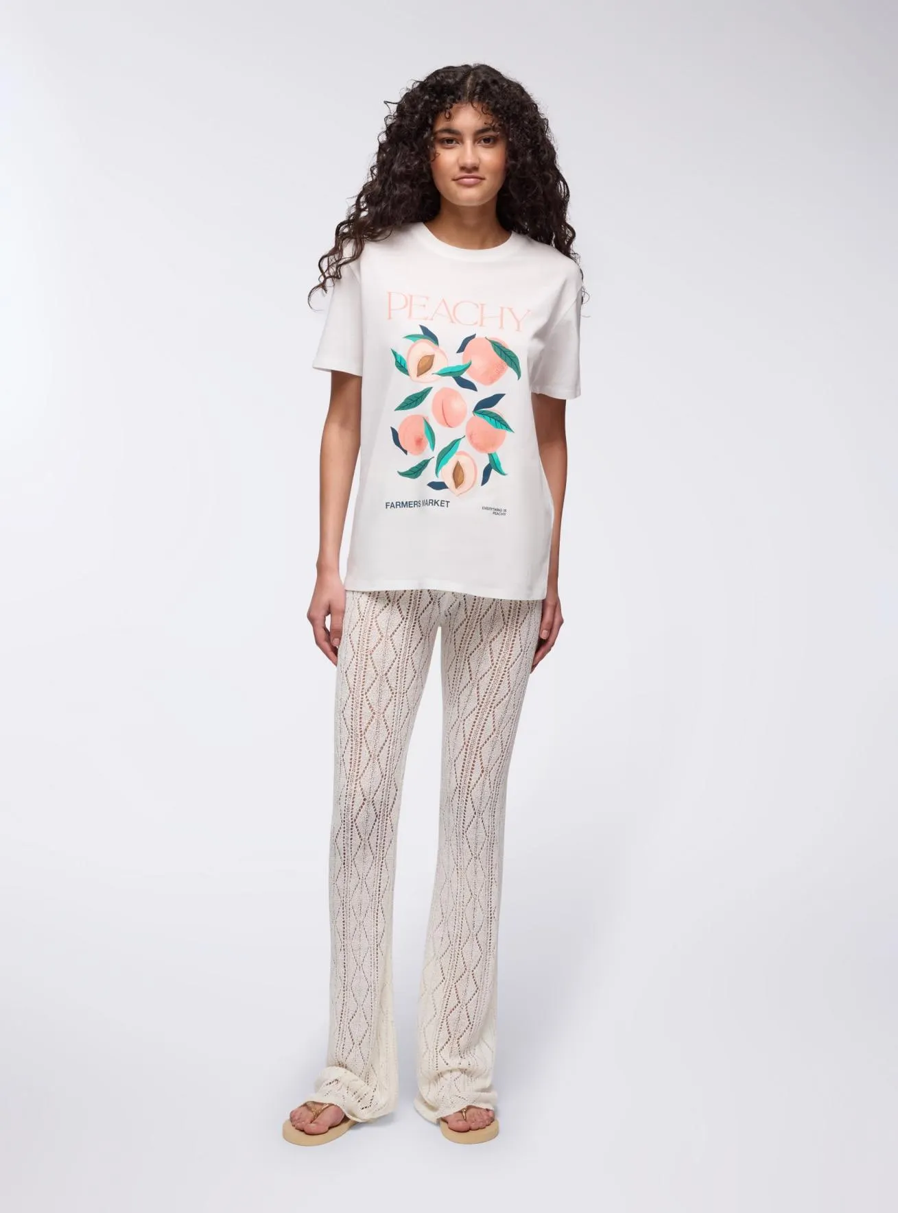 Pantaloni flare in maglia traforata Bianco lana