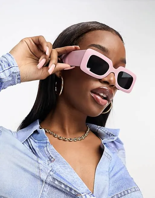 ASOS DESIGN - Occhiali da sole spessi con stanghette ampie rosa opaco