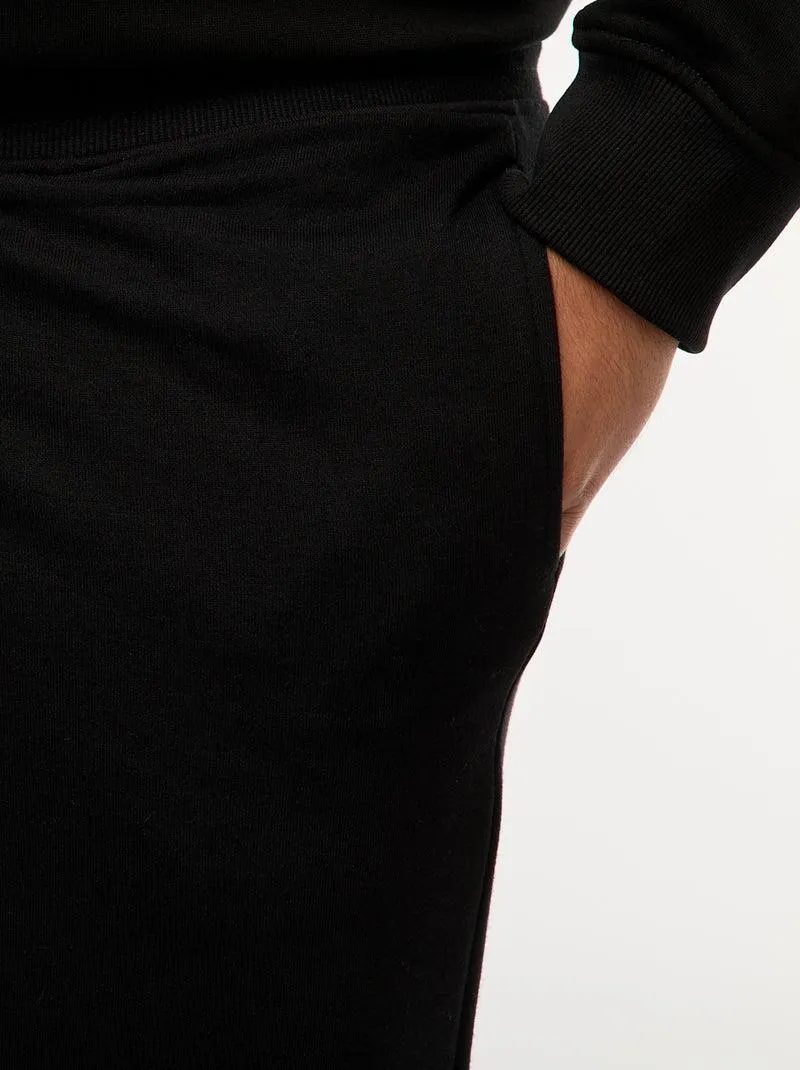 Joggers in tessuto felpato tinta unita - nero