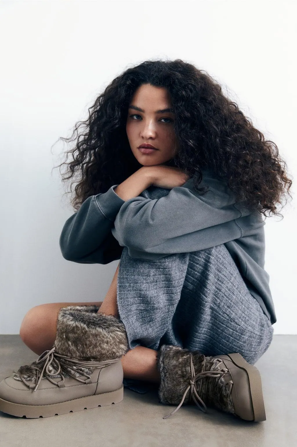 STIVALETTI BASSI IN PELLICCIA SINTETICA