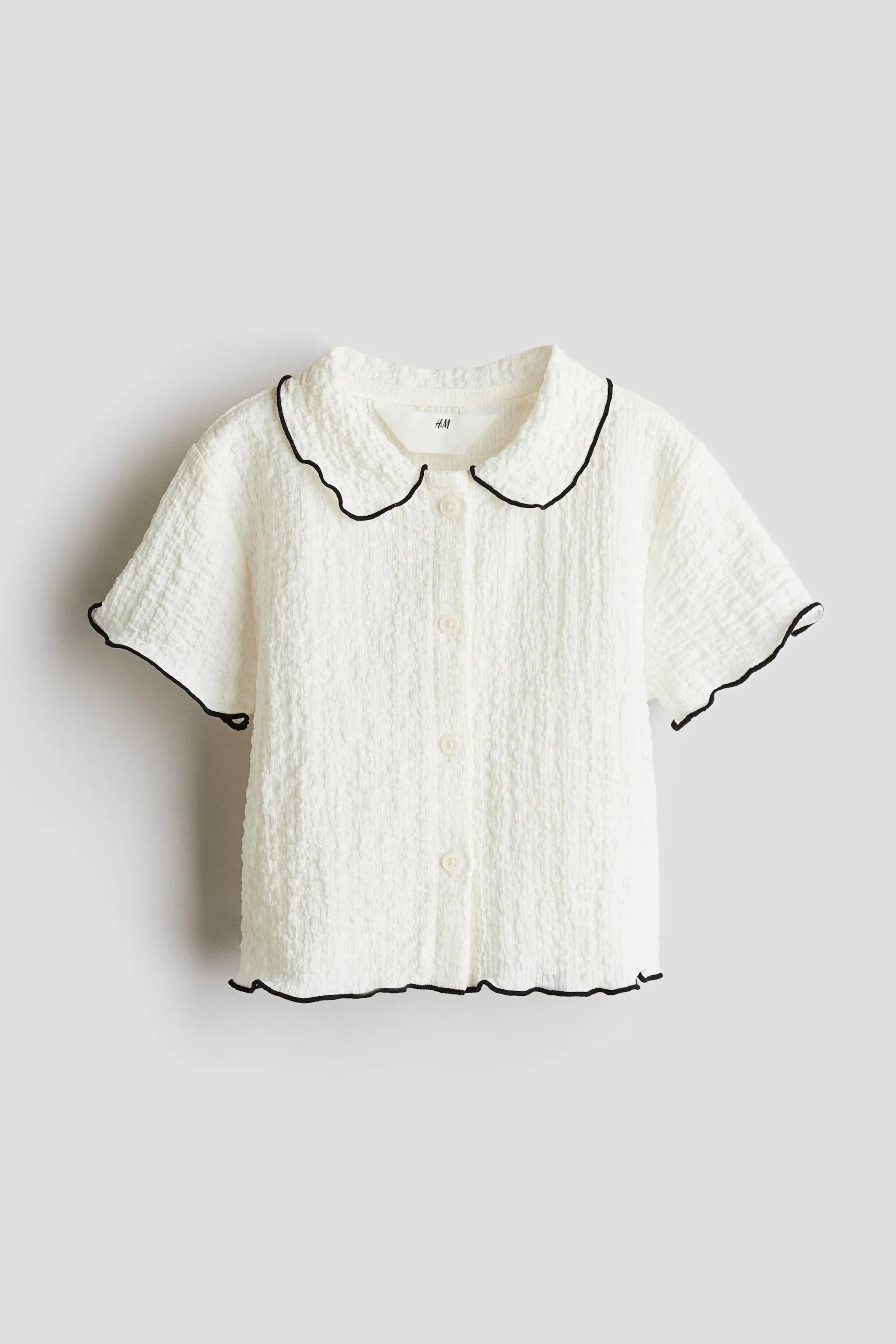 Blusa en punto corrugado