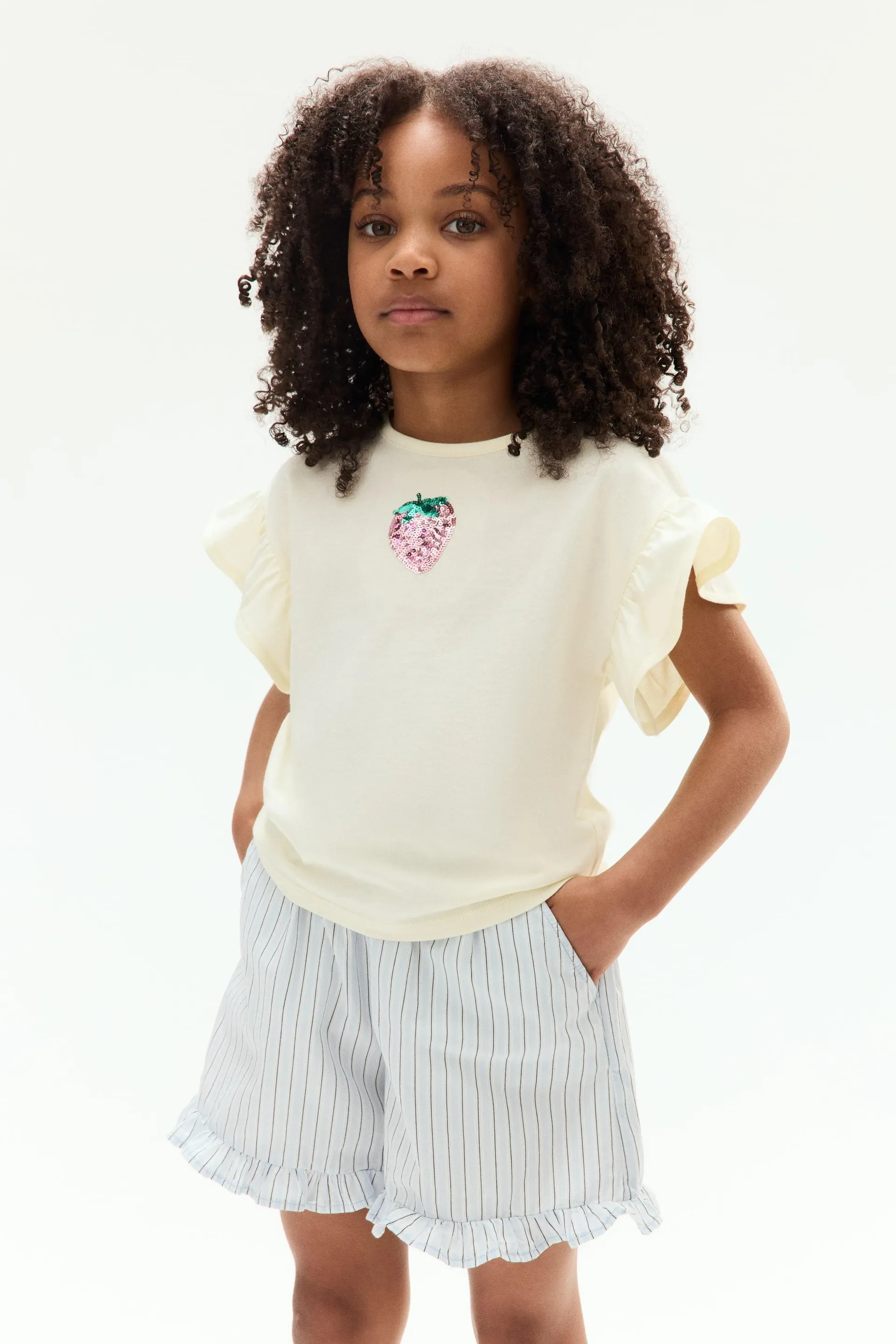 Top de algodón con lentejuelas