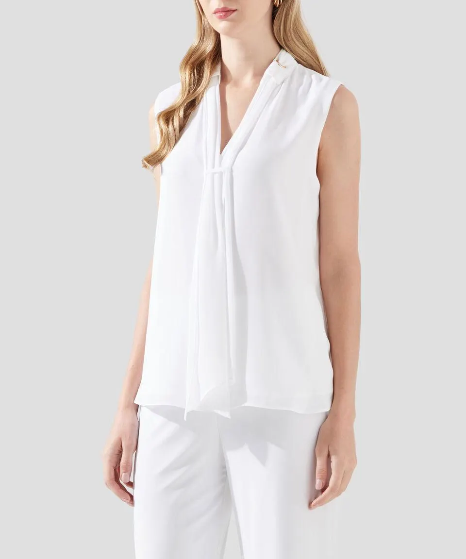 Blusa lisa sin mangas Mujer