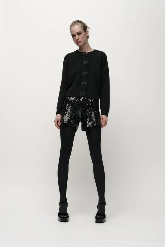 SUÉTER PUNTO BOTONES LAZOS