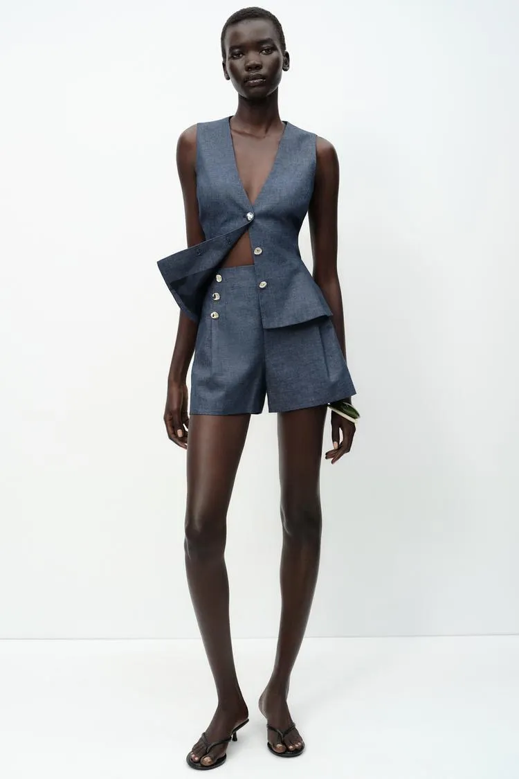 CHALECO PEPLUM CON LINO