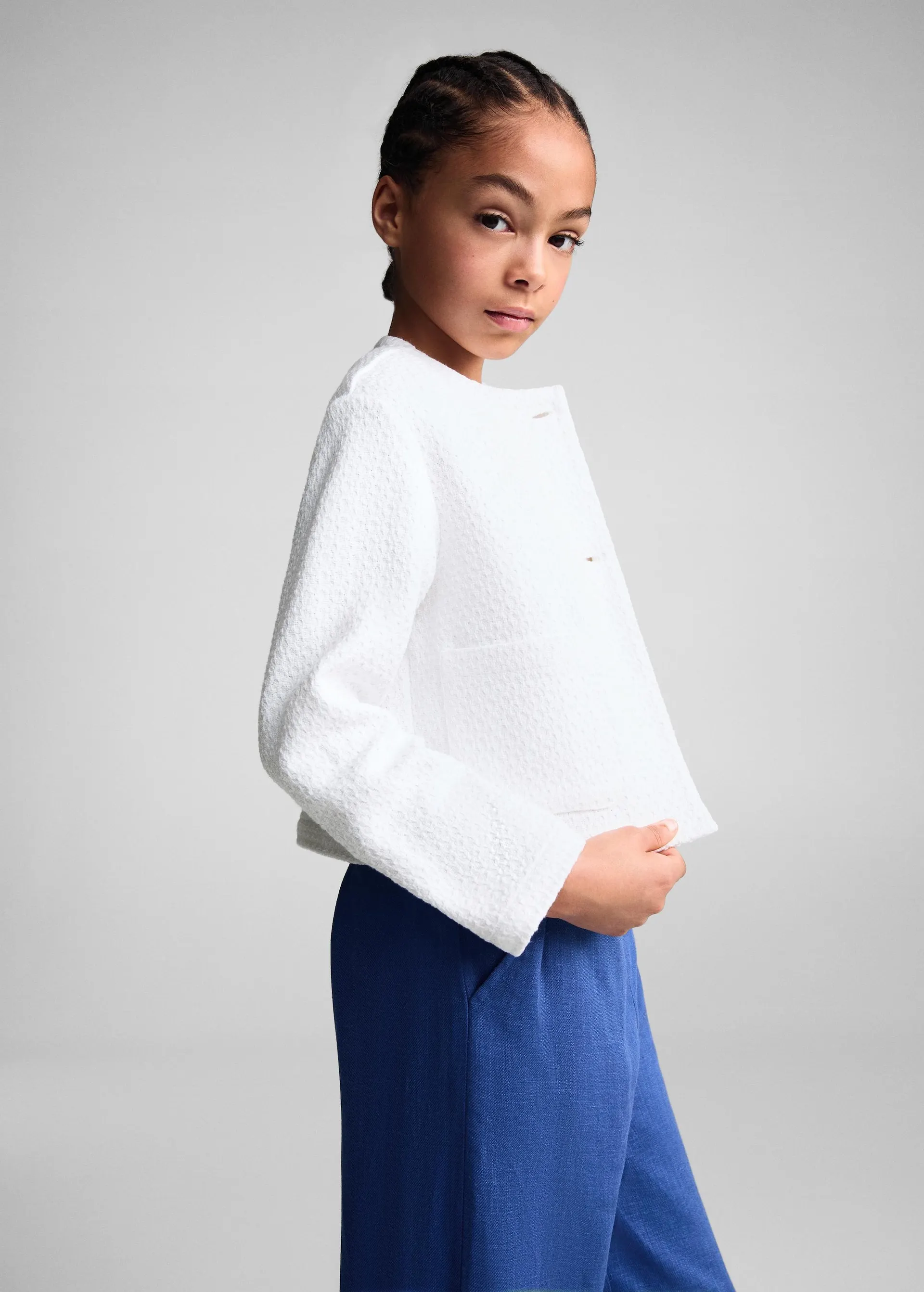 Chaqueta tweed bolsillos