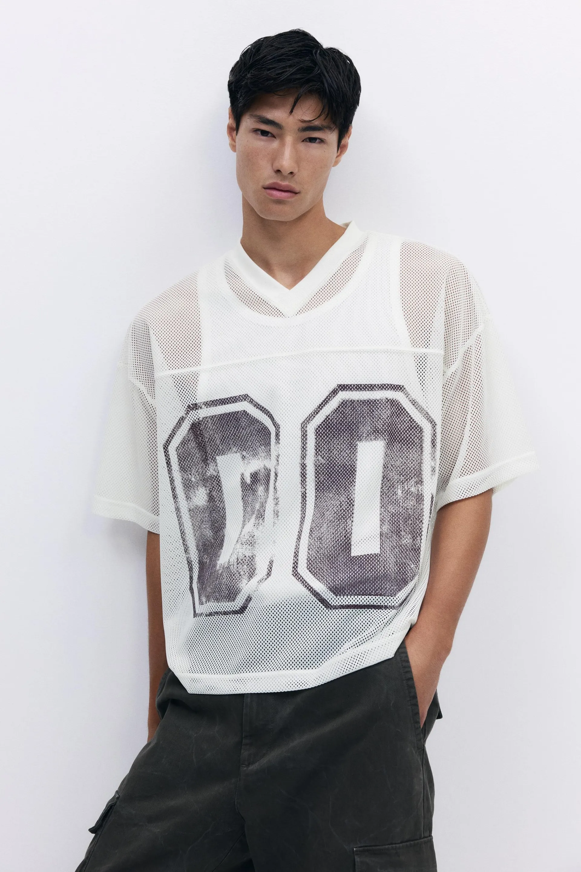 Playera Oversized Fit en malla con diseño