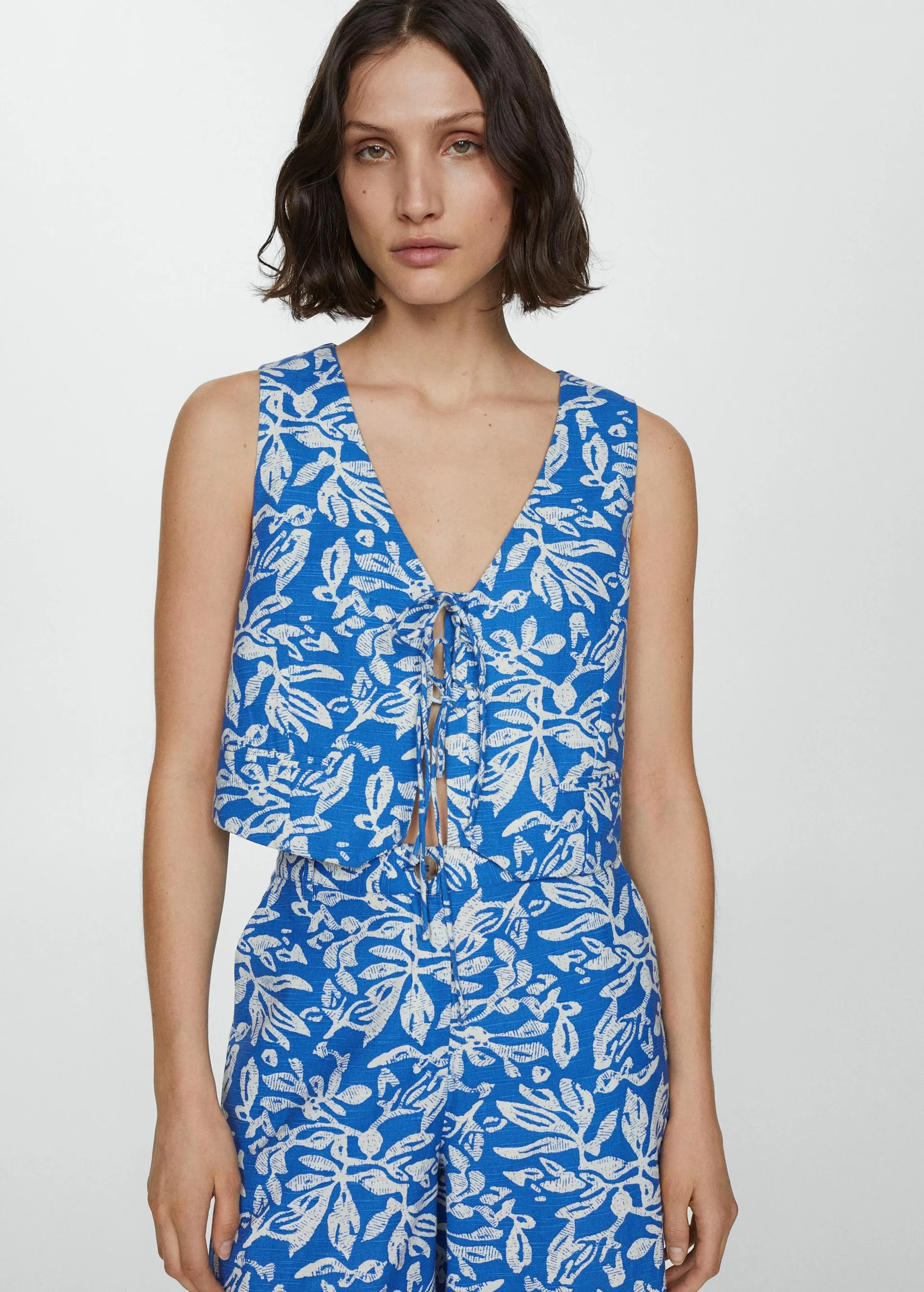 Chaleco cierre lazos