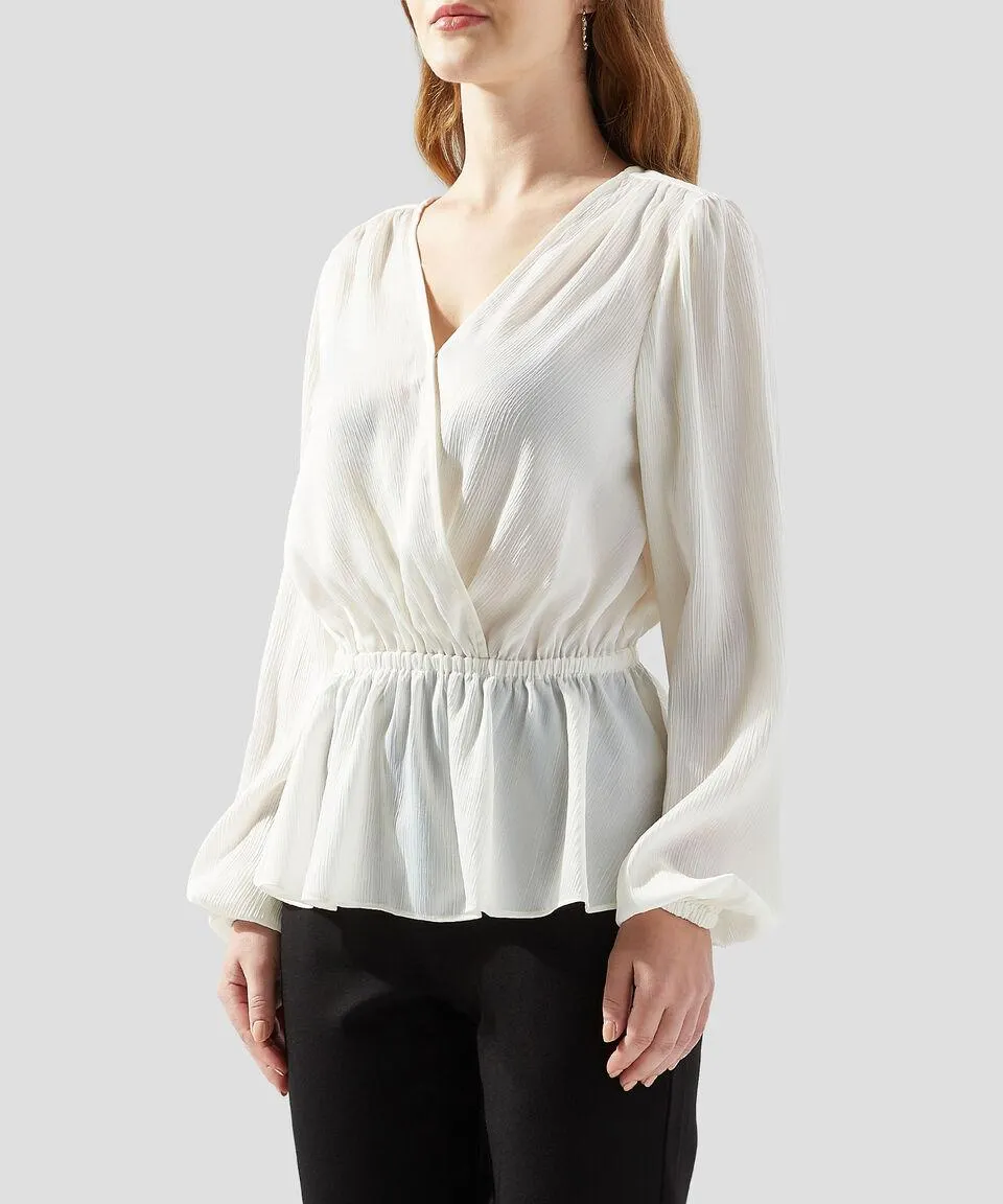 Blusa lisa manga larga Mujer