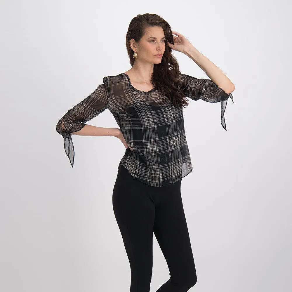 Blusa a cuadros en transparencia