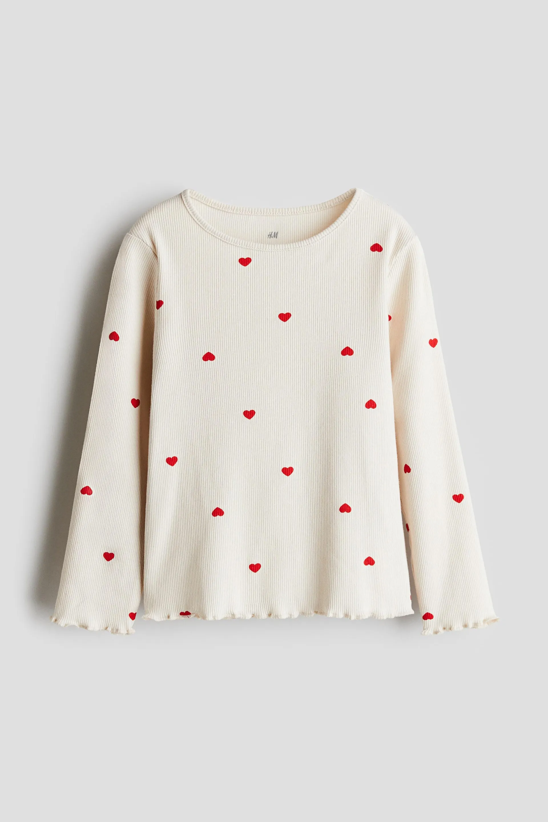 Top de manga larga en punto