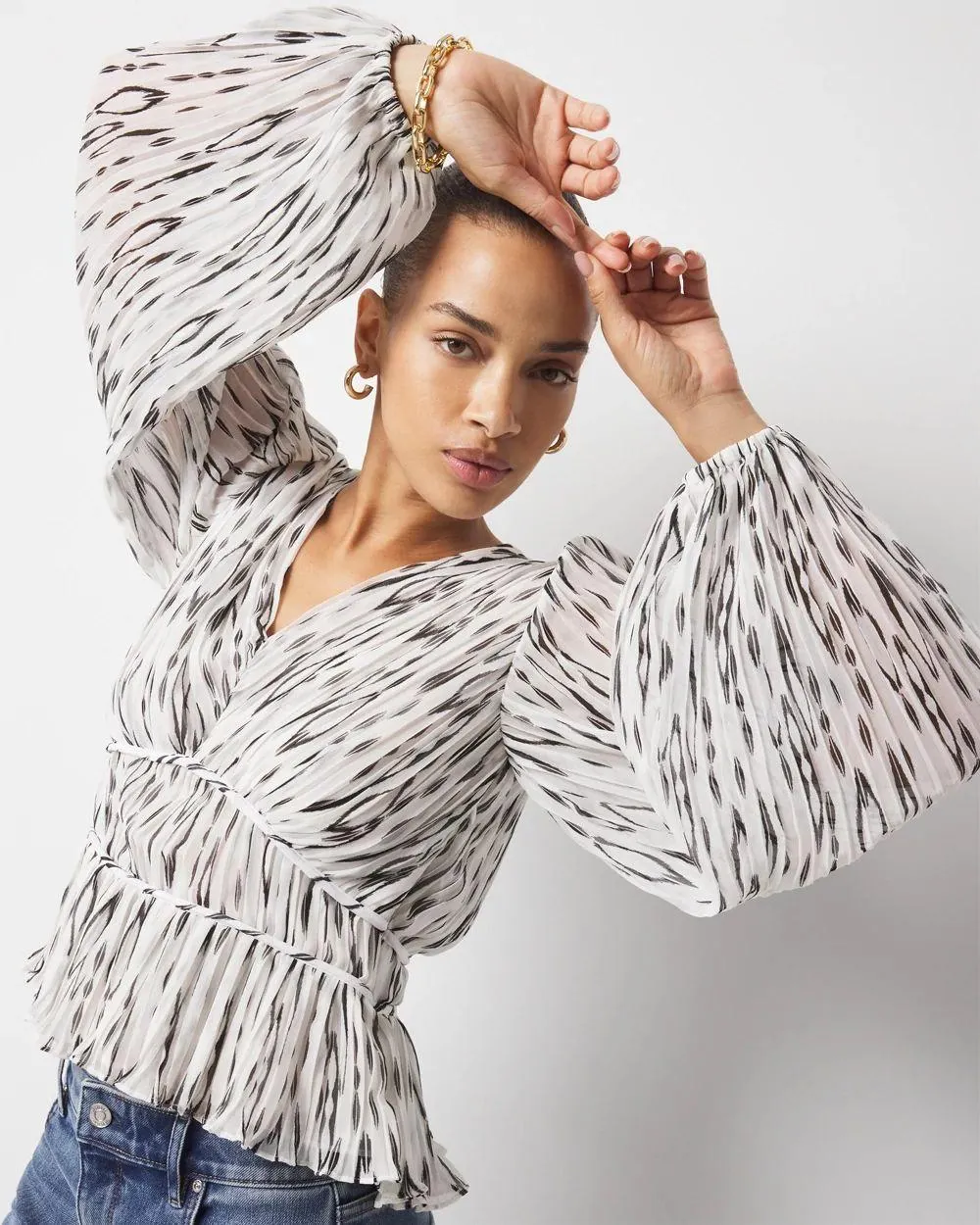 Ikat Pleated Peplum Blouse