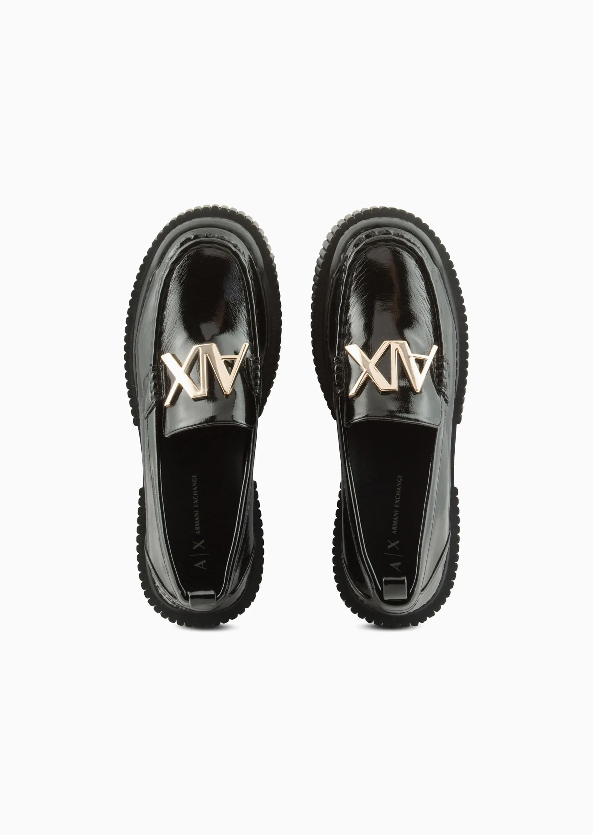 Mocasines de piel ecológica con dije de logo