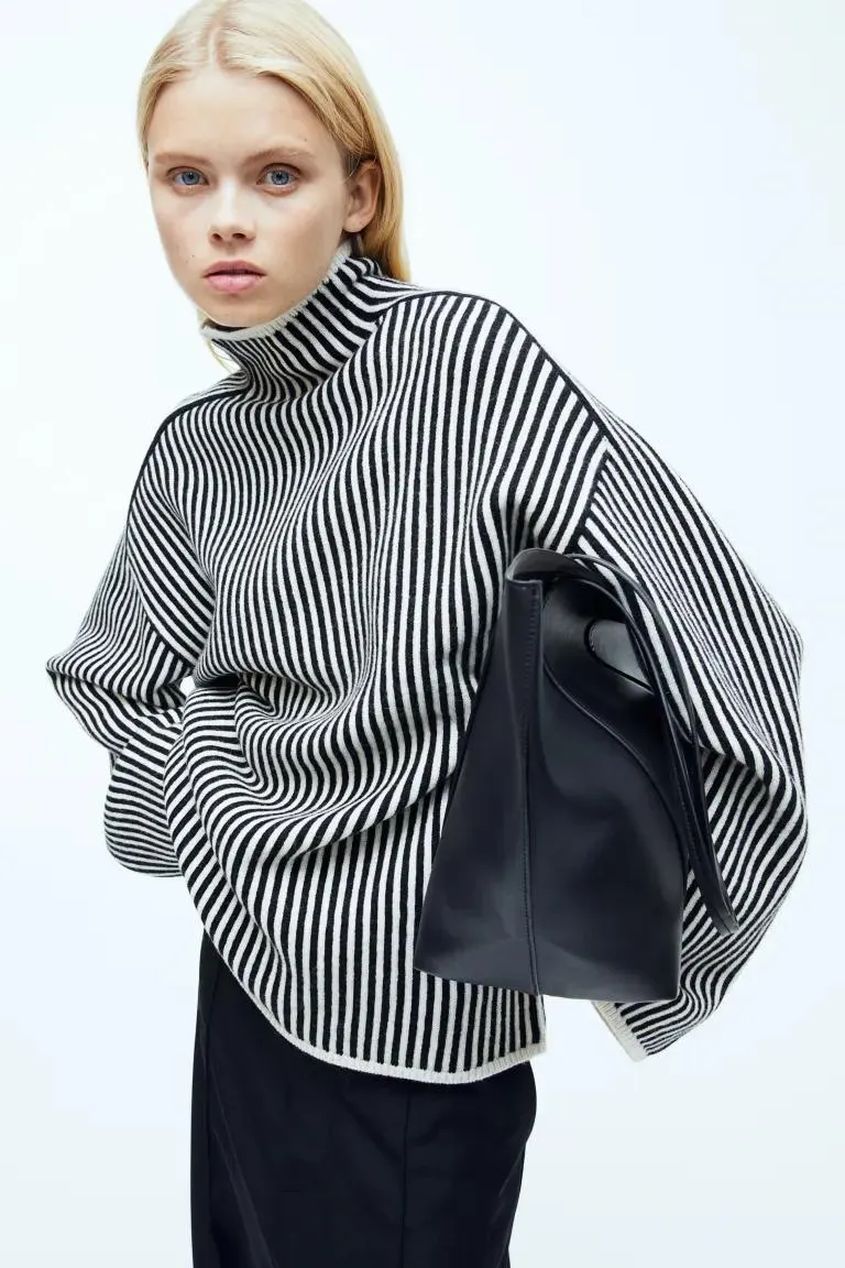 Suéter oversized de cuello alto