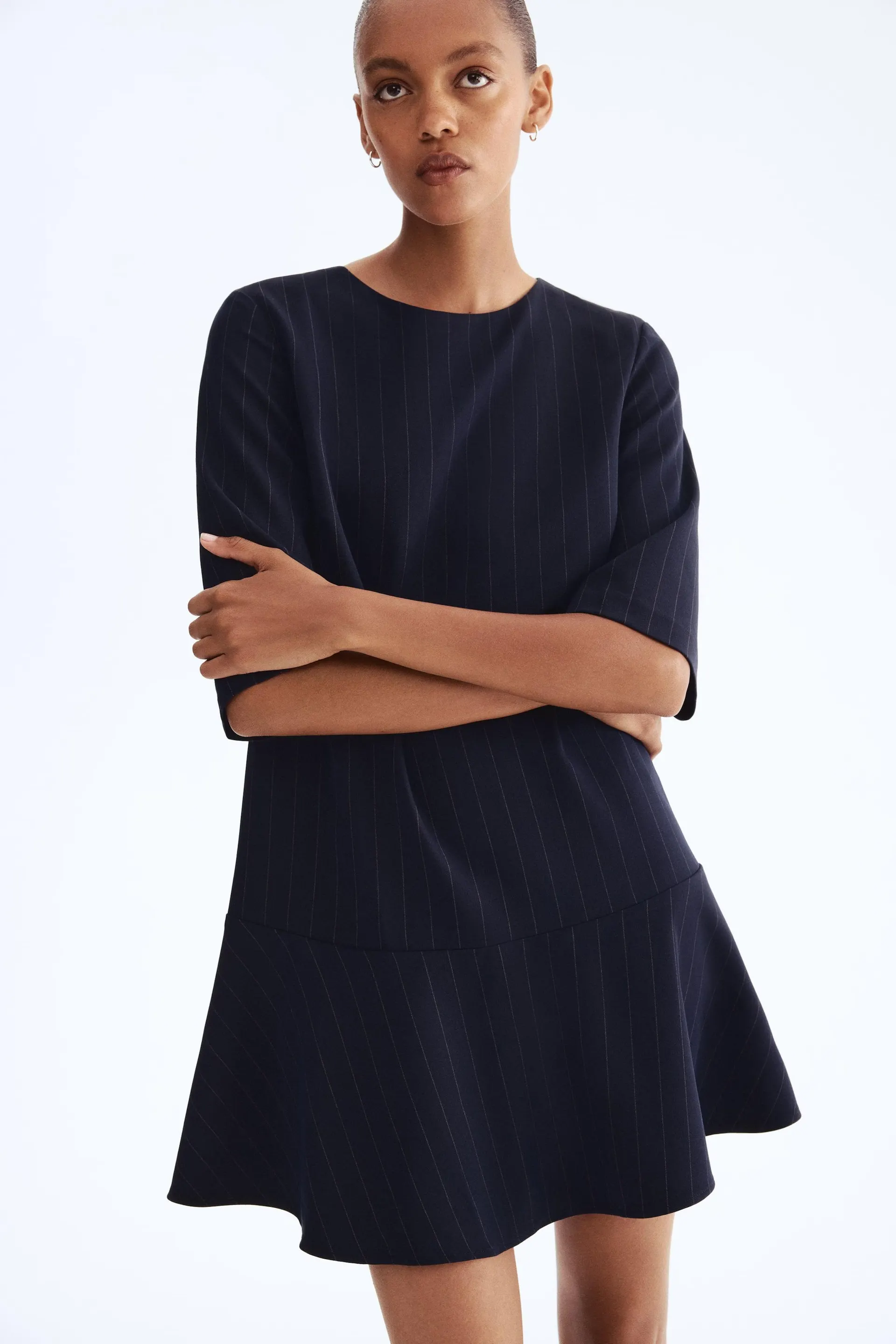 Vestido recto con falda circular