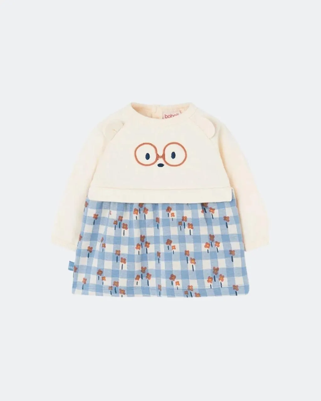 Vestido beige con falda de cuadros azul