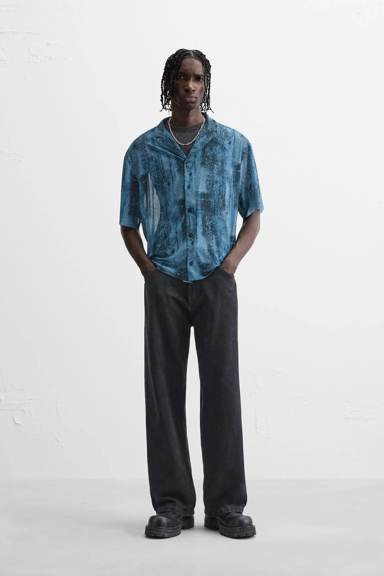 CAMISA SEMITRANSPARENTE ESTAMPADA