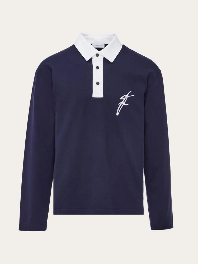 Polo manga larga con cuello a contraste