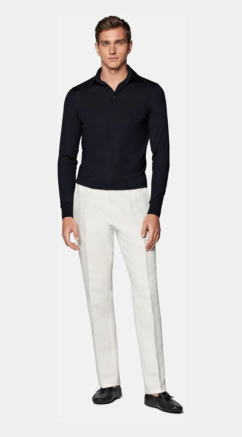 Dress it up under a tailored jacket or swap your shirt with it for a more casual anytime style—this navy long-sleeve polo shirt is an easygoing seasonal must-have.