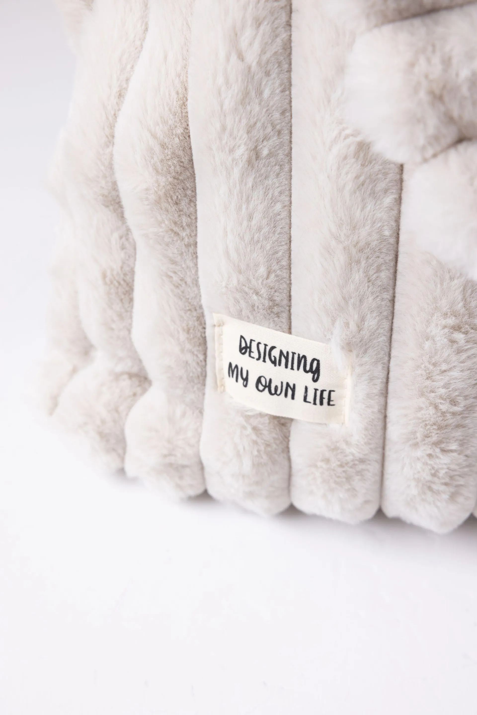 Zandkleurige tas van imitatiebont